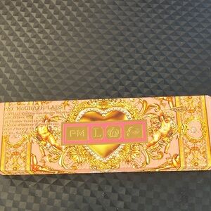 Pat McGrath Shimmering Eyeshadow Palette with Pink and Gold Hues